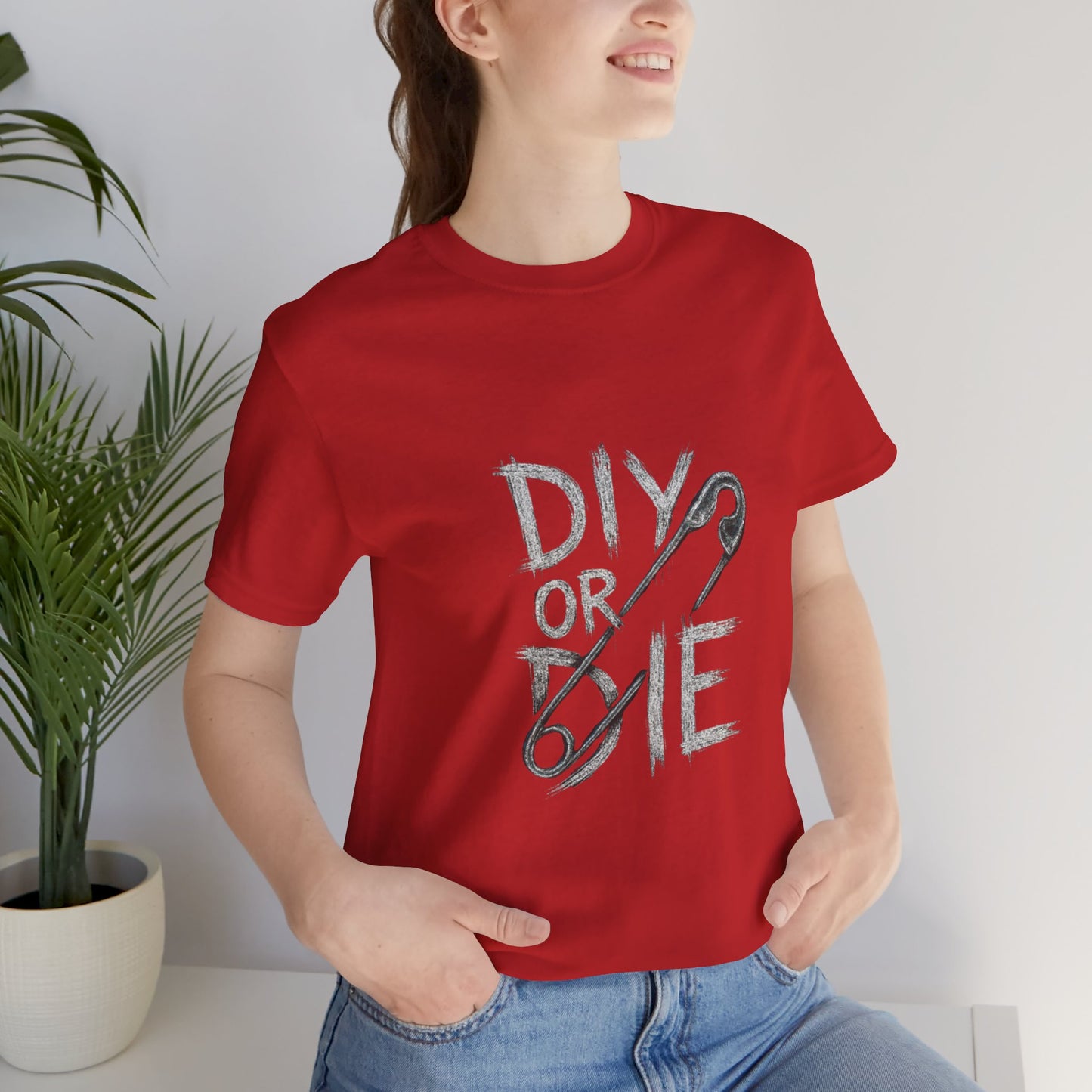 Punk Tee with Hand-Drawn Text and Glitched Safety Pin