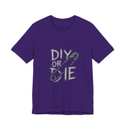 Punk Tee with Hand-Drawn Text and Glitched Safety Pin
