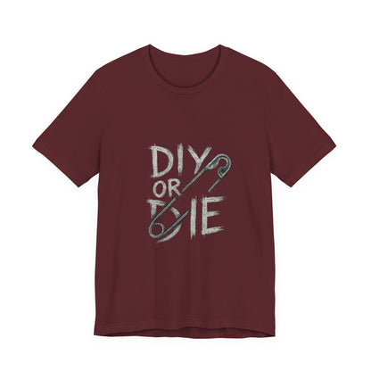 Punk Tee with Hand-Drawn Text and Glitched Safety Pin